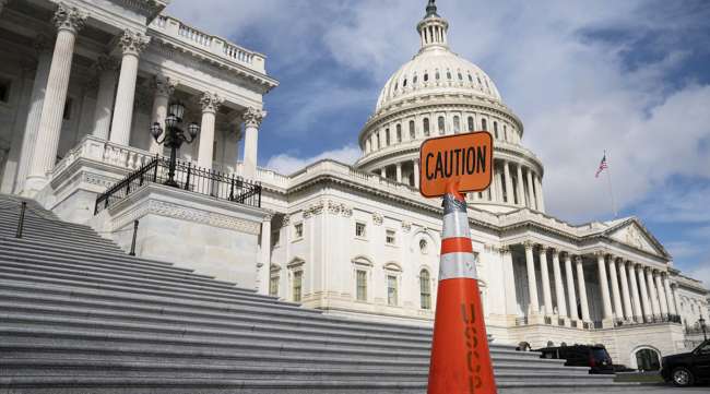 A caution sign outside the U.S. Capitol in Washington Sept. 21