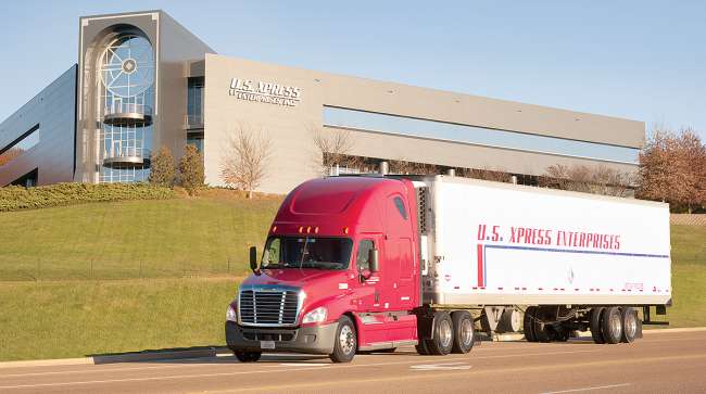 U.S. XPress truck drives by headquarters