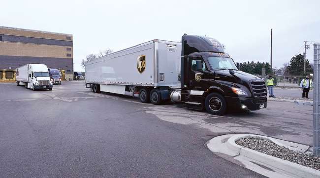 UPS truck leaves Pfizer