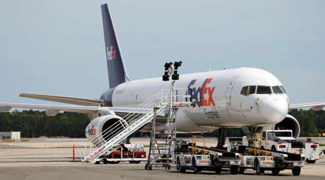 A FedEx cargo plane sits idle at the Richmond International Airport in Virginia.