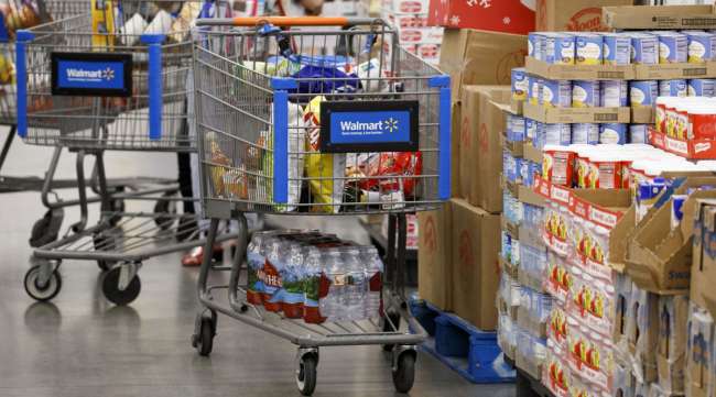 A shopping cart inside a Walmart location in Burbank, Calif.
