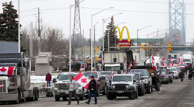 Truckers and supporters block the access leading from the Ambassador Bridge, linking Detroit and Windsor.