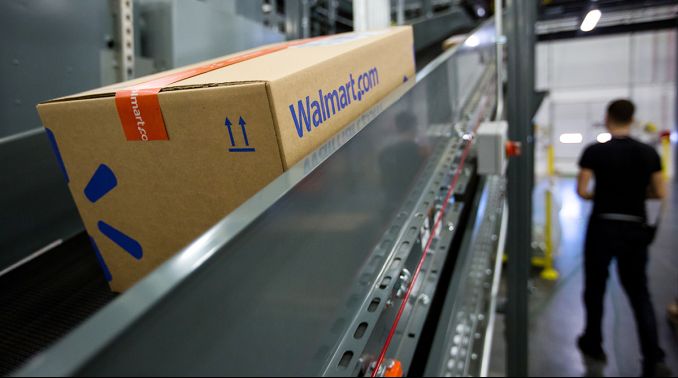A package on a conveyor belt at a Walmart fulfillment center.