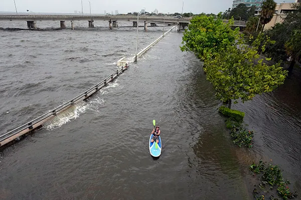Paddleboarder during Hurricane Idalia