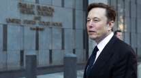 Elon Musk departs the Phillip Burton Federal Building