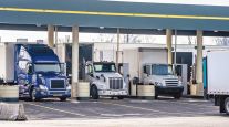 Trucks at a fueling station