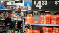 A worker organizes items at a Walmart Supercenter