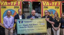 Trucking Cares Foundation presents check