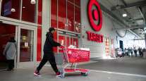 A shopper leaves a Target store in New York
