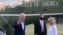 President Biden and Jill Biden depart Marine One while returning to the Ellipse May 23.