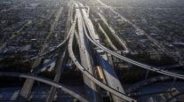 Vehicles drive in light traffic on freeways in Los Angeles, Calif. (Patrick T. Fallon/Bloomberg News)
