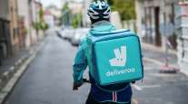  A food delivery courier for Deliveroo in Paris