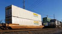 J.B. Hunt Intermodal containers move by rail in Louisville, Ky.