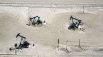 Oil well pump jacks operated by Chevron Corp. in San Ardo, California, U.S.
