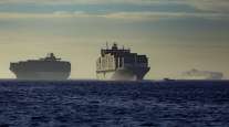 Containerships at anchor outside the Port of Los Angeles. (Tim Rue/Bloomberg News)