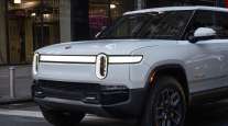 Rivian Stumbles in Earnings Debut With Miss on EV Output