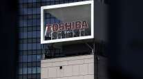 Signage for Toshiba Corp. displayed at the company's headquarters in Tokyo, Japan