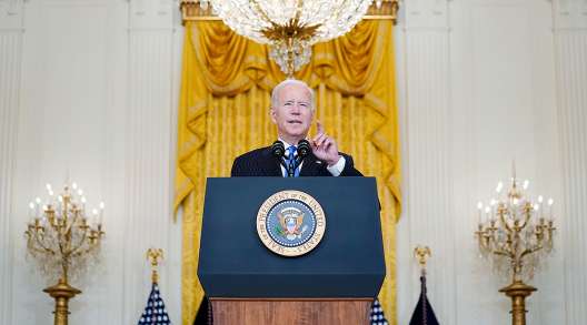 President Joe Biden speaks about addressing the supply chain problem