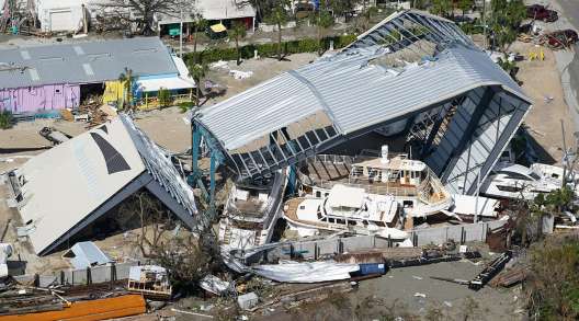 Damaged boats and structures in Fort Myers Beach, Fla. 