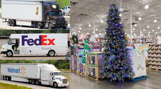 UPS, FedEx and Walmart trucks along with a Christmas tree display