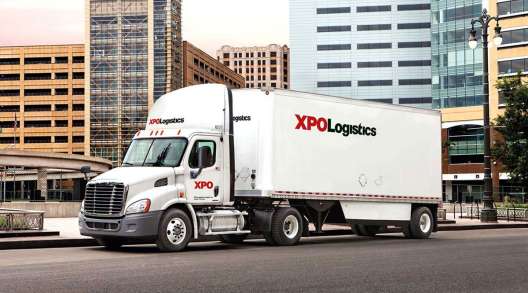 XPO Logistics truck on city street