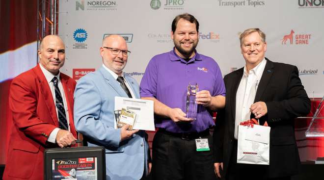 TMCSuperTech champion Phillip Pinter of FedEx Freight with TMC executives