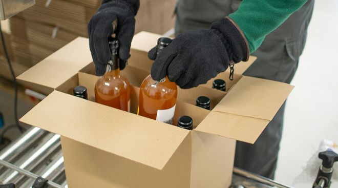 Bottles of wine placed in a box