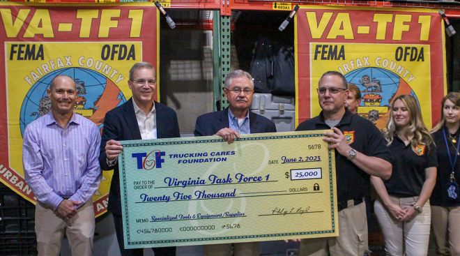 Trucking Cares Foundation presents check