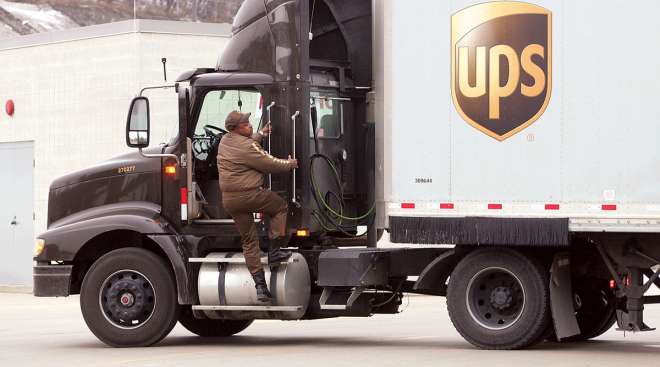 UPS driver exits truck