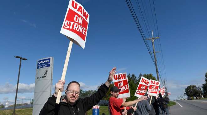 UAW workers on strike at a Mack plant