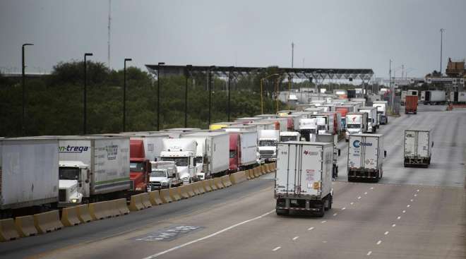 Trucks cross into the U.S. at Laredo, Texas