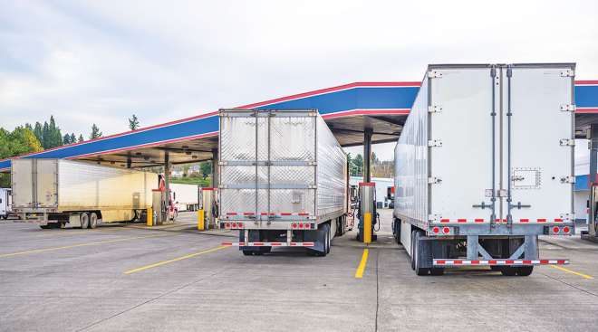 Trucks at a fueling station