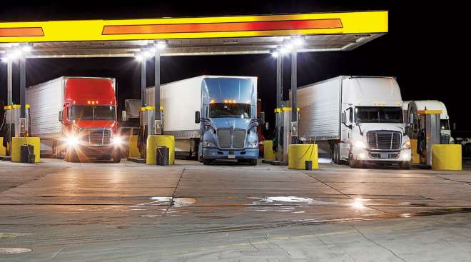 Trucks fueling at a truck stop