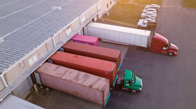 Trucks parked at loading dock