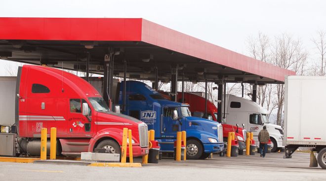 Trucks fueling at a service station
