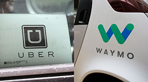 Uber and Waymo logos